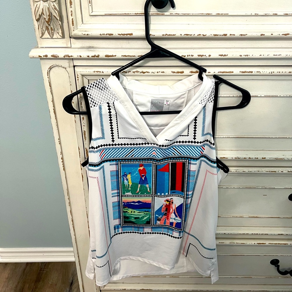 White golf top.
